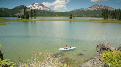 Kayaker on a mountain lake Stock Footage 44189840