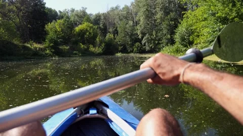 Kayaker navigating through serene waters, capturing the essence of outdoor Stock Footage 328645243