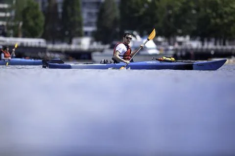 Kayaker at pacific ocean Stock Photos