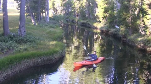Kayaker paddling down a channel 스톡 동영상 41717975