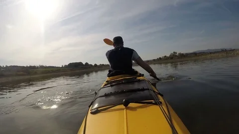 Kayaker paddling speed up Stock Footage 81586944