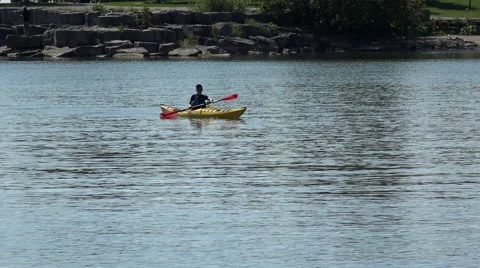 Kayaker returnig from the lake. Stock Footage 66730347
