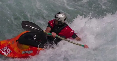 Kayaker riding the Rapids. 库存影片 69095844