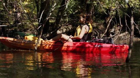 A kayaker on a river Stock Footage 138597694