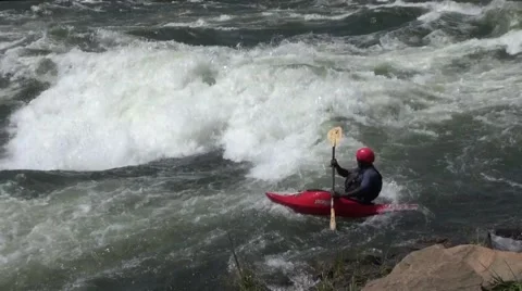 Kayaker rowing on the wild waters of the White Nile Stock Footage 44333829