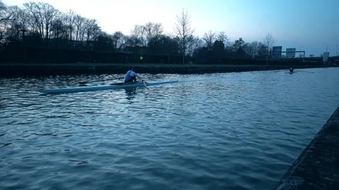 Kayaker rows quickly through the water. Stock Footage 85488788