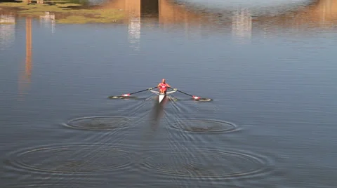 Kayaker Rows towards bridge in Florence Italy Stock Footage 38216456