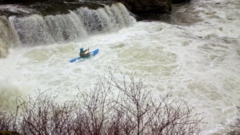 Kayaker shoots powerful waterfall 스톡 동영상 83206771