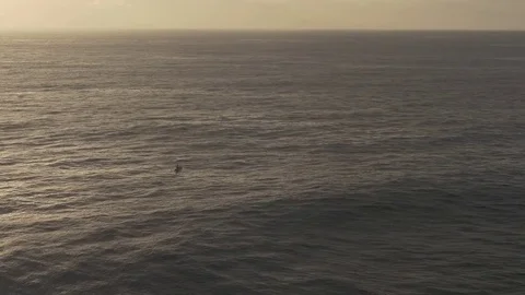 Kayaker in Small Boat in Middle of Ocean at Sunrise Aerial View 库存影片 72436682