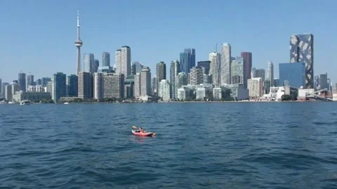 Kayaker with Toronto Skyline in background Stock Footage 249635424