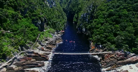 Kayakers paddling in Storms River Stock Footage 308920655