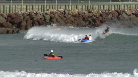 Kayakers playing in surf Video stock 51635763