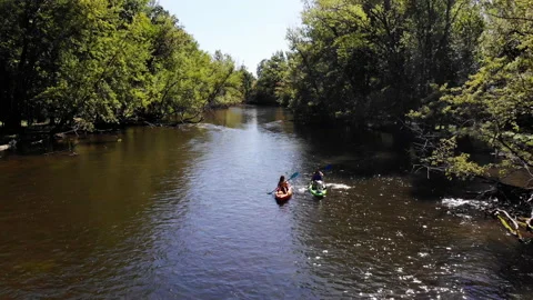 Kayakers on a river Stock Footage 138387405