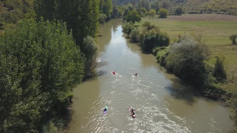 Kayakers at river valley Video stock 129245633