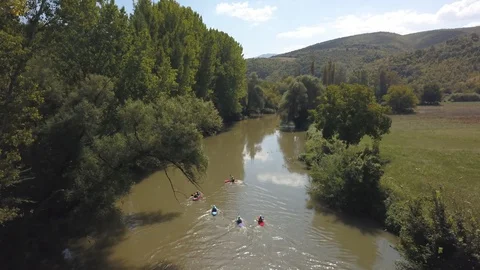 Kayakers at river valley Stock Footage 129247467