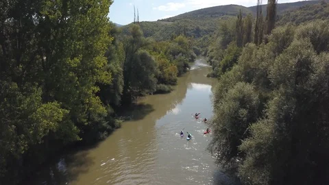 Kayakers at river valley Stock-Footage 129248027