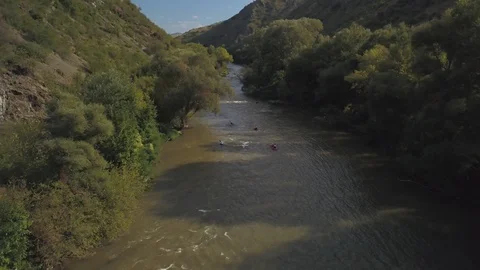 Kayakers at river valley Stock-Footage 129264374
