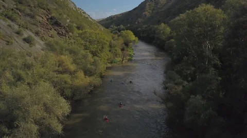 Kayakers at river valley Stock-Footage 129264684