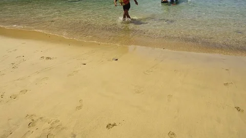 Kayakers in the sea and on the beach in Playa de Papagayo Lanzarote Spain Video stock 88057553