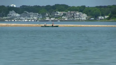 Kayaking along sandbar Stock Footage
