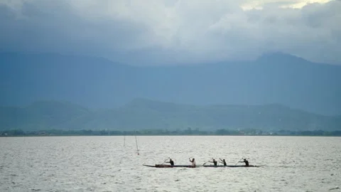 Kayaking on alpine lakes, distant mountain landscapes Stock Footage 314150289