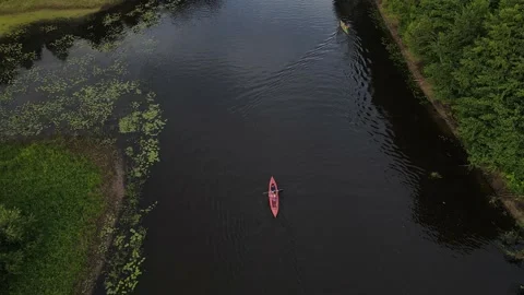 Kayaking and Canoeing along the Riverbed Aerial View. Rafting. Stock Footage 158242477