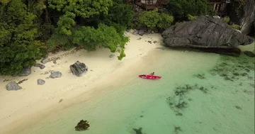 Kayaking By a Beach Stock Footage 85480620