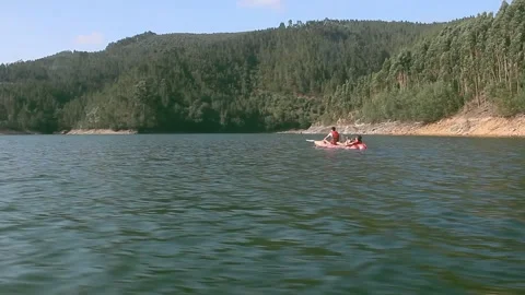 Kayaking on a beautiful river 스톡 동영상 257980999