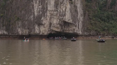 Kayaking Boating Limestone Cliffs Caves Lagoons Ha Long Bay, Vietnam Stock Footage 329009331