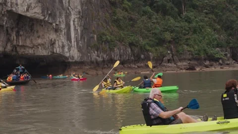Kayaking Boating Limestone Cliffs Caves Lagoons Ha Long Bay, Vietnam Stock Footage 329009507