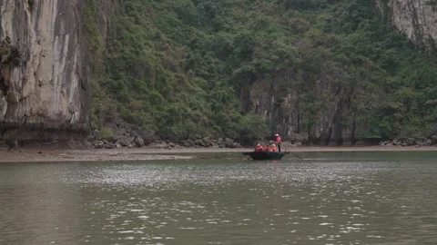 Kayaking Boating Limestone Cliffs Caves Lagoons Ha Long Bay, Vietnam Stock Footage 329010559