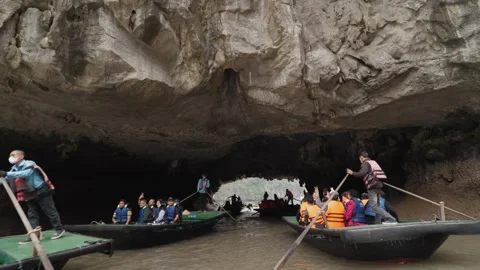 Kayaking Boating Limestone Cliffs Caves Lagoons Ha Long Bay, Vietnam Stock Footage 329010644