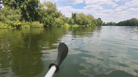 Kayaking On a Calm River Stock Footage 205066694
