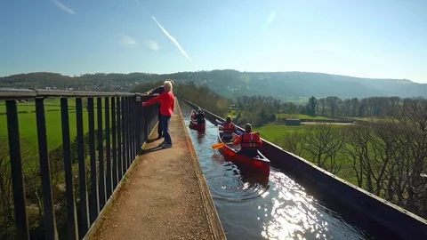 Kayaking, canoeing over Pontcysyllte Aqueduct Stock Footage 106136853