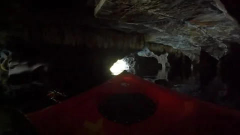 Kayaking in a cave Stock Footage 243595487
