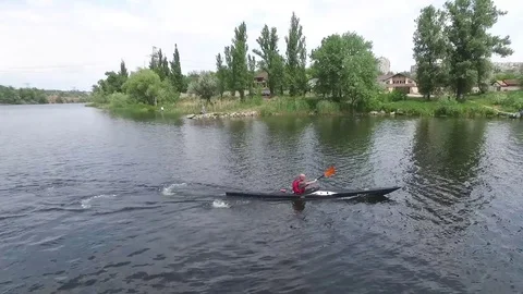 Kayaking. Coup. Diving under the water in a kayak Stock Footage 82663207