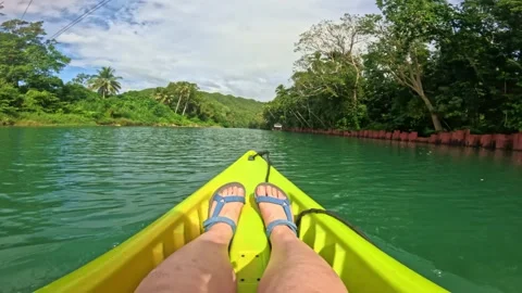 Kayaking down the calm Lobok river on Bohol island, Philippines, with tropical Видео 318901246
