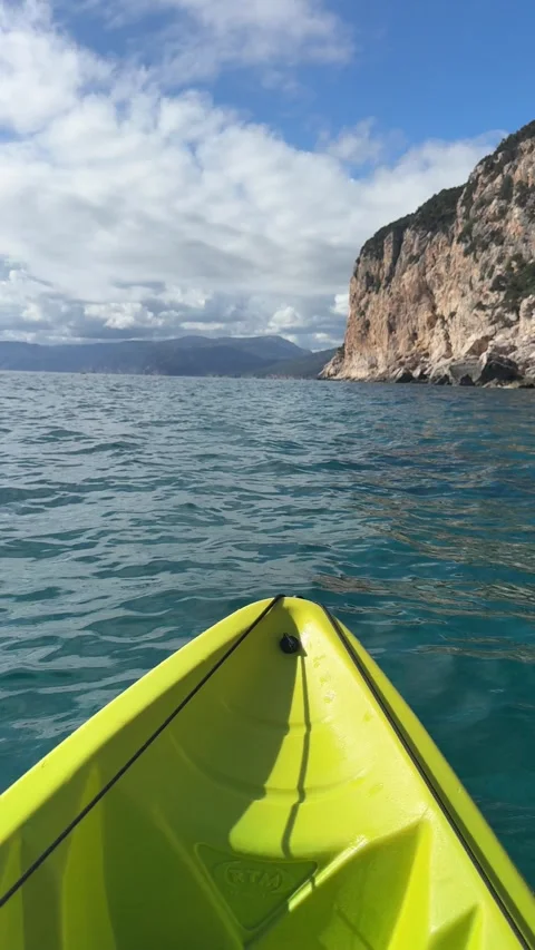 Kayaking from a first-person perspective on the turquoise Tyrrhenian Sea  Stock Footage 333795806