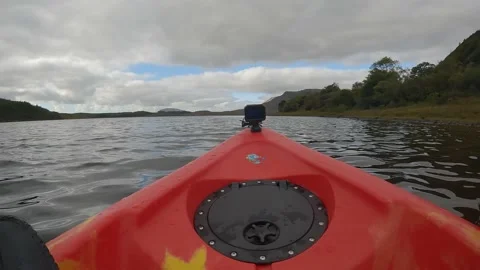 Kayaking footage towards mountain range Stock Footage 232961498