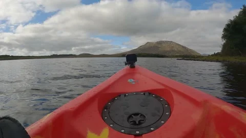 Kayaking footage towards mountain range Stock Footage 232961686