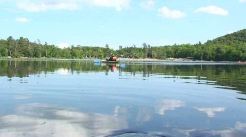 Kayaking on a Lake in the Summer Stock Footage 458515