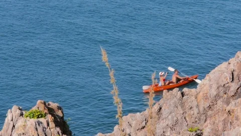 Kayaking in the open sea 動画素材 77529316