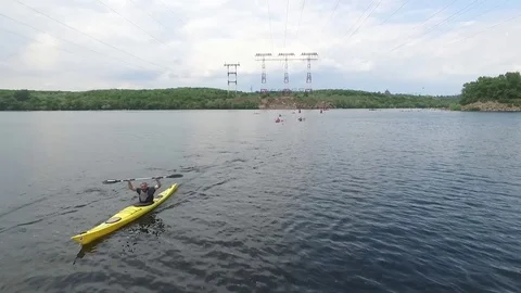 Kayaking Quadrocopter over the river and kayaks 1 Stock Footage 83174654