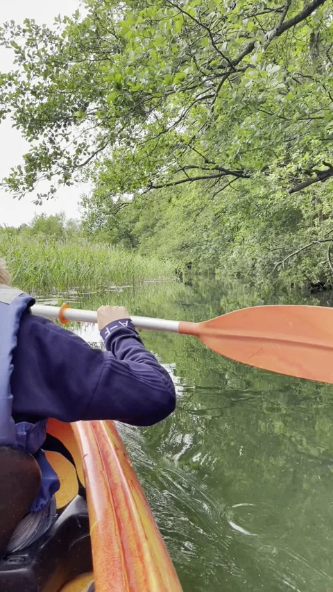 Kayaking on a quiet river Video stock 312275208