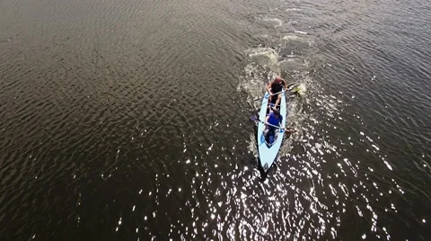 Kayaking on the river between the reeds Stock Footage 64348797