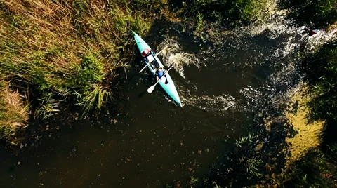 Kayaking on the river between the reeds Stock Footage 64363480