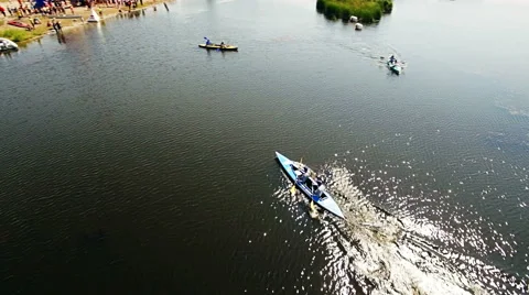 Kayaking on the river between the reeds Stock Footage 64518010