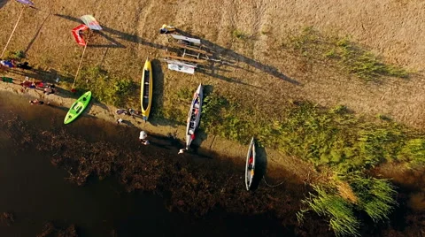 Kayaking on the river between the reeds Stock Footage 64523655