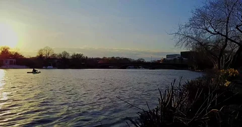 Kayaking In The River During A Sunset Stock Footage 76237737