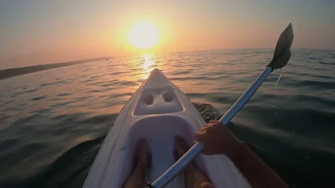 Kayaking at sunset Stock-Footage 148127048